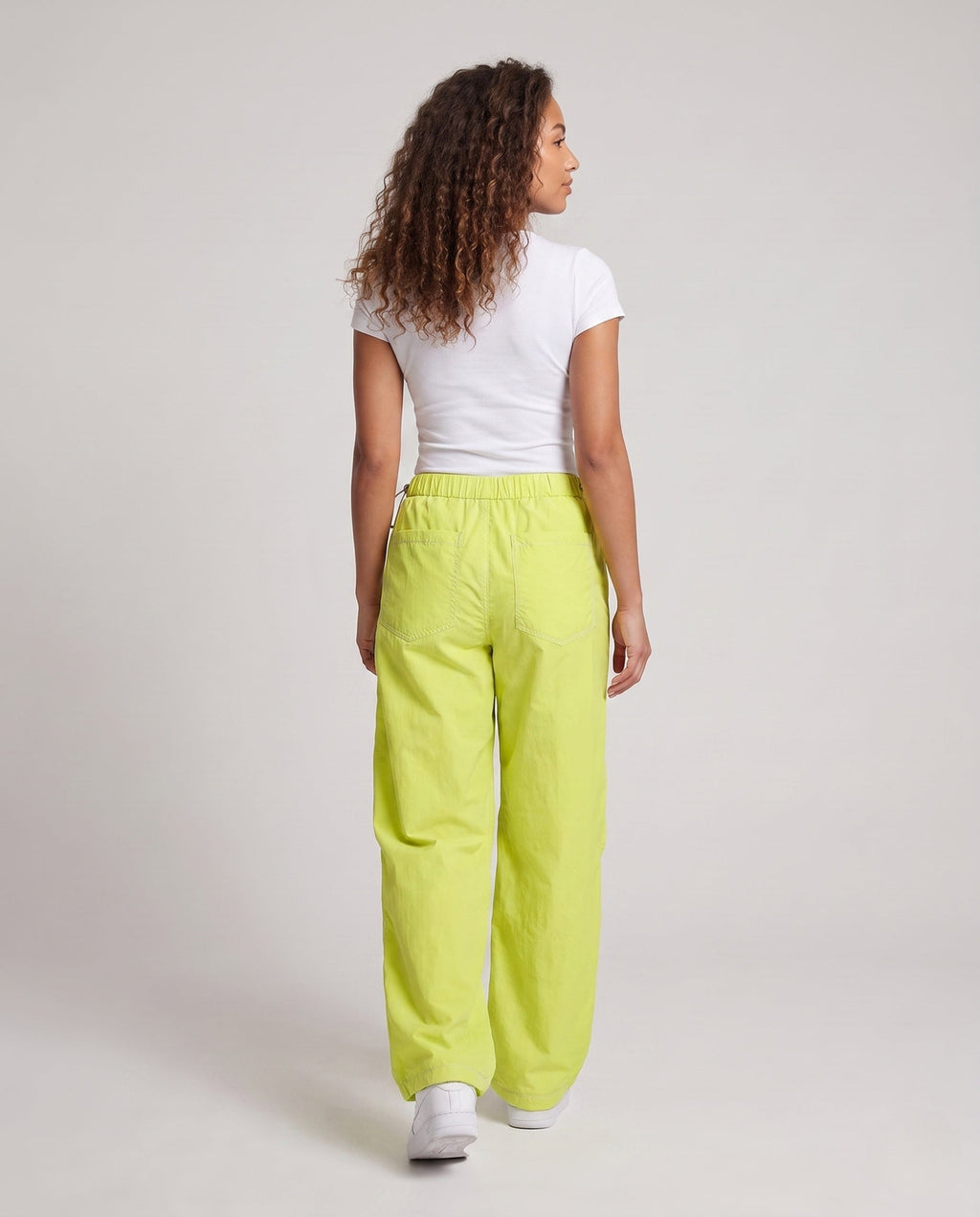 Ladies fashionable cargo pants with high wearing comfort and practical pockets - back view