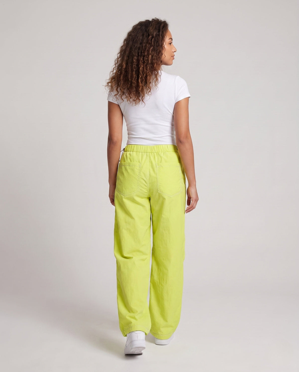 Ladies fashionable cargo pants with high wearing comfort and practical pockets - back view