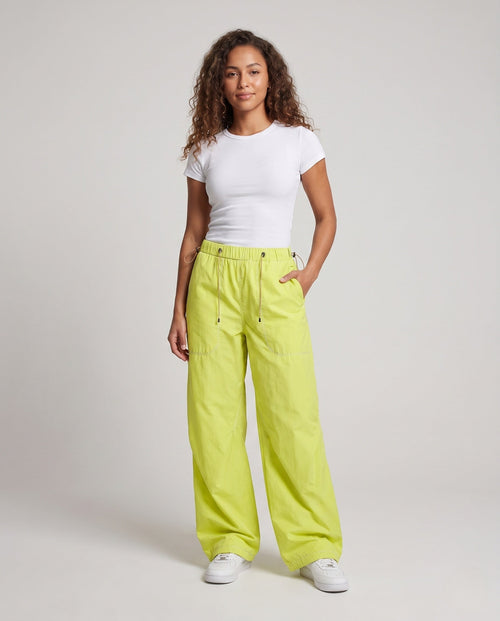Ladies fashionable cargo pants with high wearing comfort and practical pockets - front view