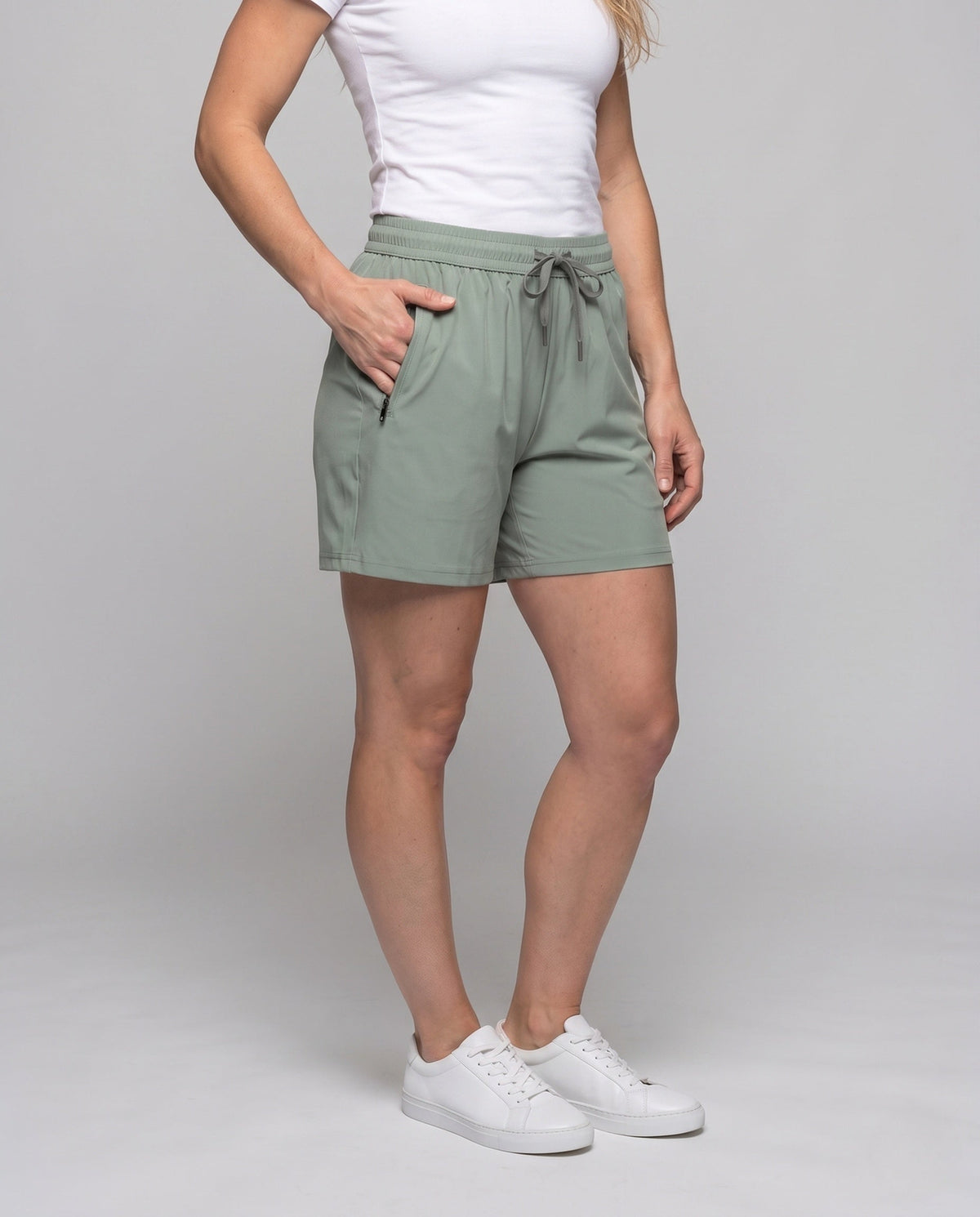 Women's Sporty Beach Shorts with Elastic Waistband and Zipper Pockets - lower body view