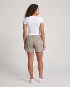 Women's sporty shorts with functional zip pockets - back view
