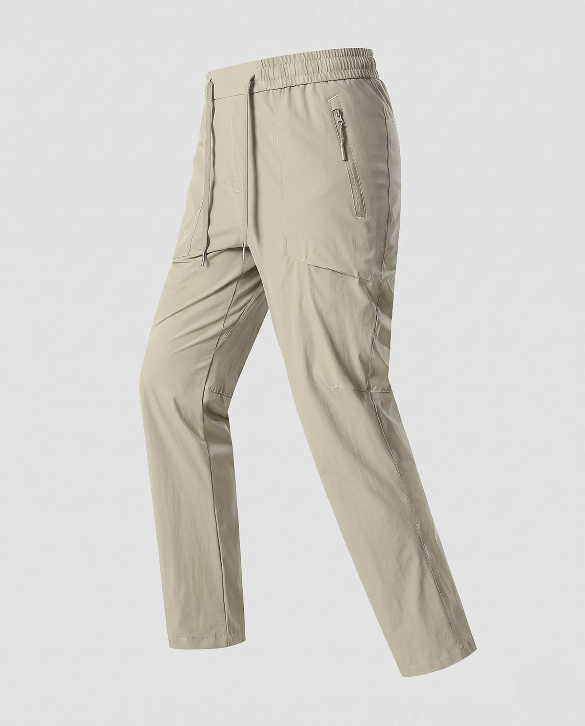 Women’s technical cargo pants with elastic waistband and practical zip pockets - product shot