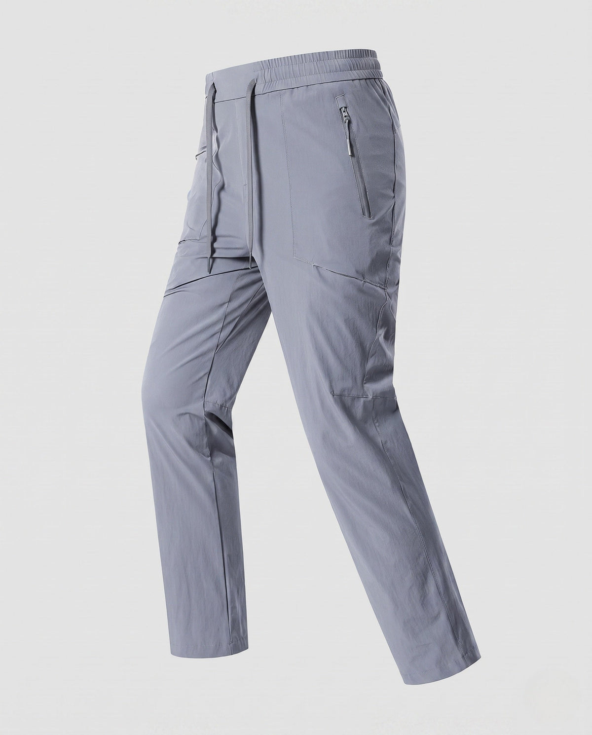 Women’s technical cargo pants with elastic waistband and practical zip pockets - product shot