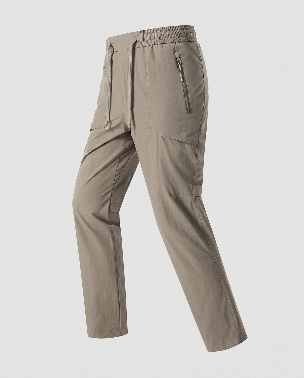 Women’s technical cargo pants with elastic waistband and practical zip pockets - product shot