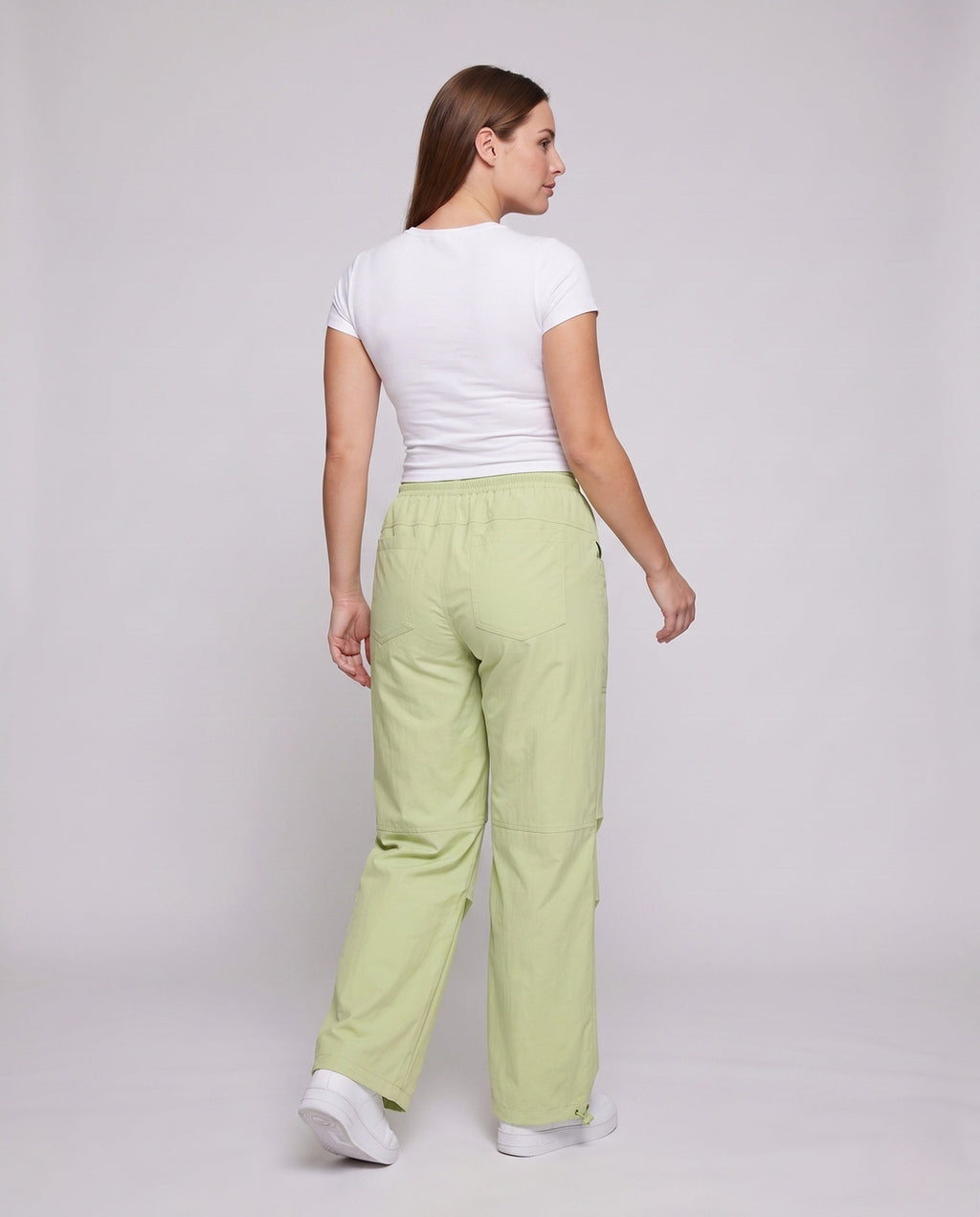 Women's technical cargo pants with adjustable waistband and multifunctional pockets - back view
