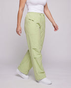 Women's technical cargo pants with adjustable waistband and multifunctional pockets - lower body view
