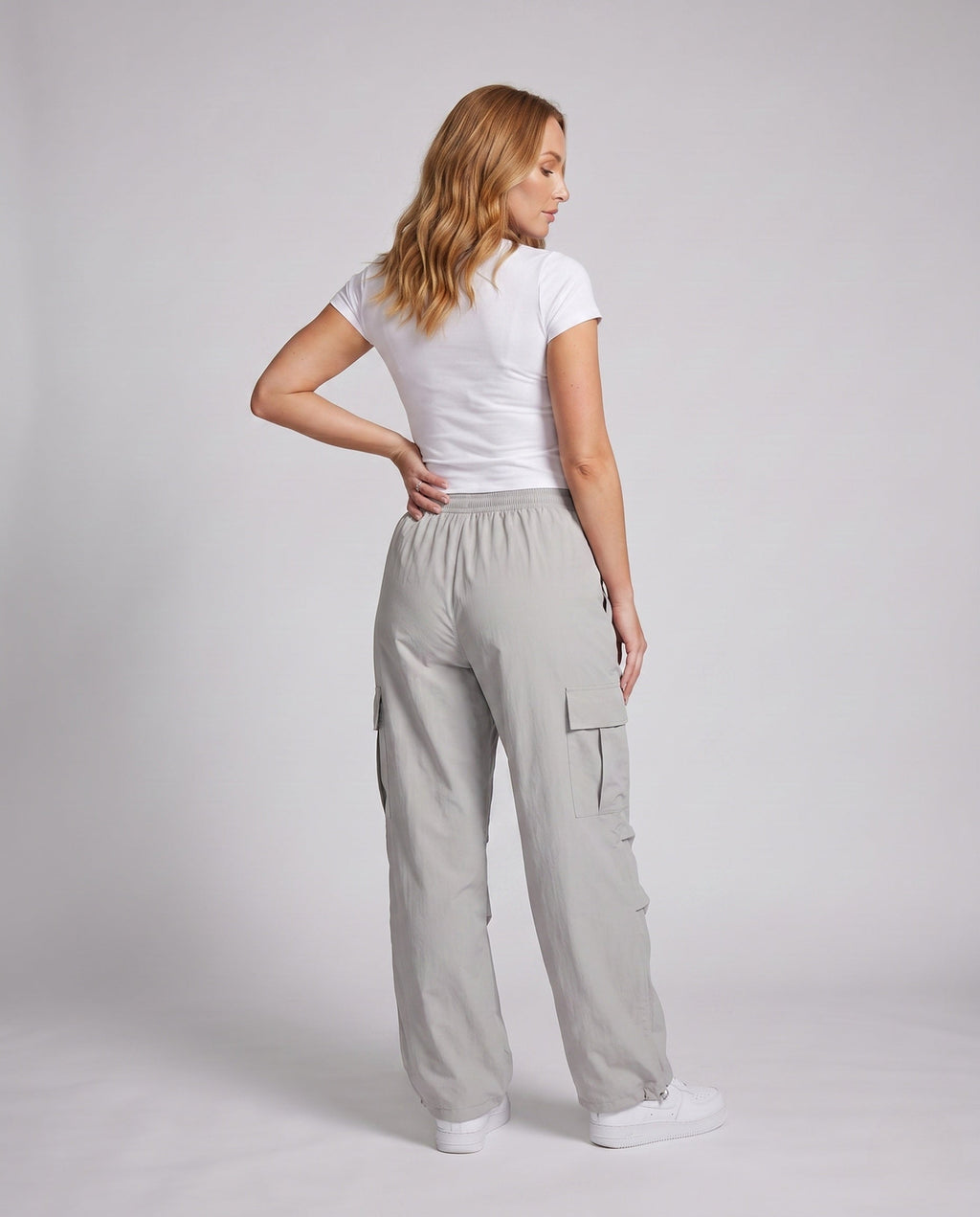 Women's cargo pants with elastic waistband and practical side pockets - back view