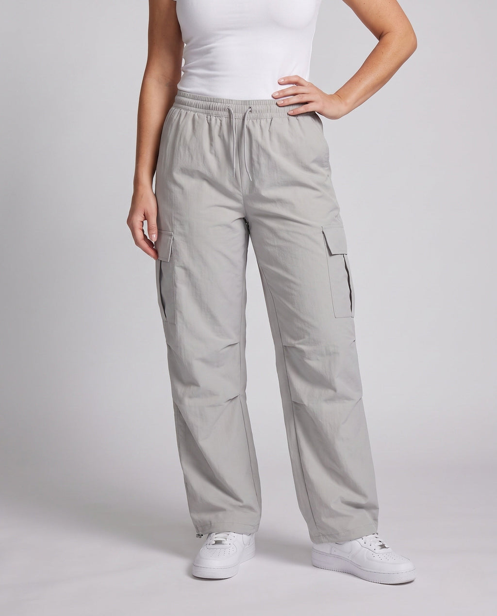 Women's cargo pants with elastic waistband and practical side pockets - lower body view