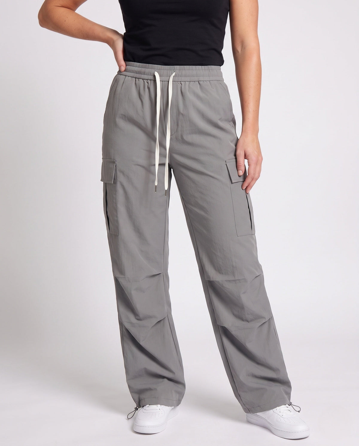 Women's cargo pants with practical side pockets and elastic waistband - lower body view
