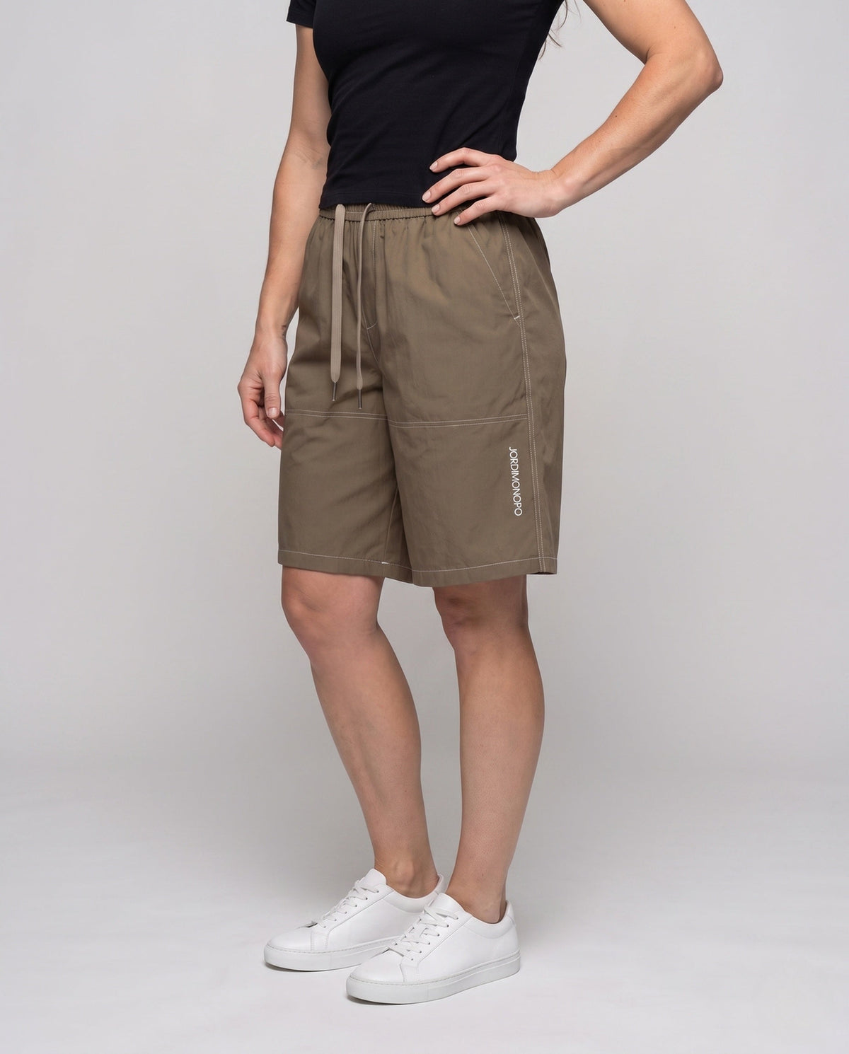 Women casual sports shorts with elastic waistband - lower body view