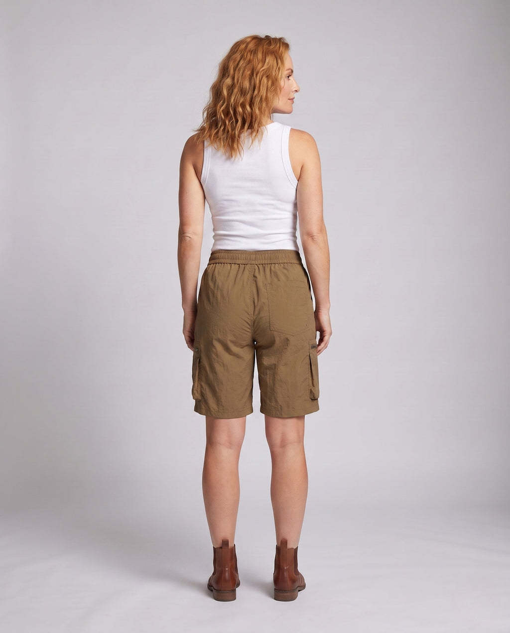 Women's sporty cargo shorts with practical zip pockets - back view