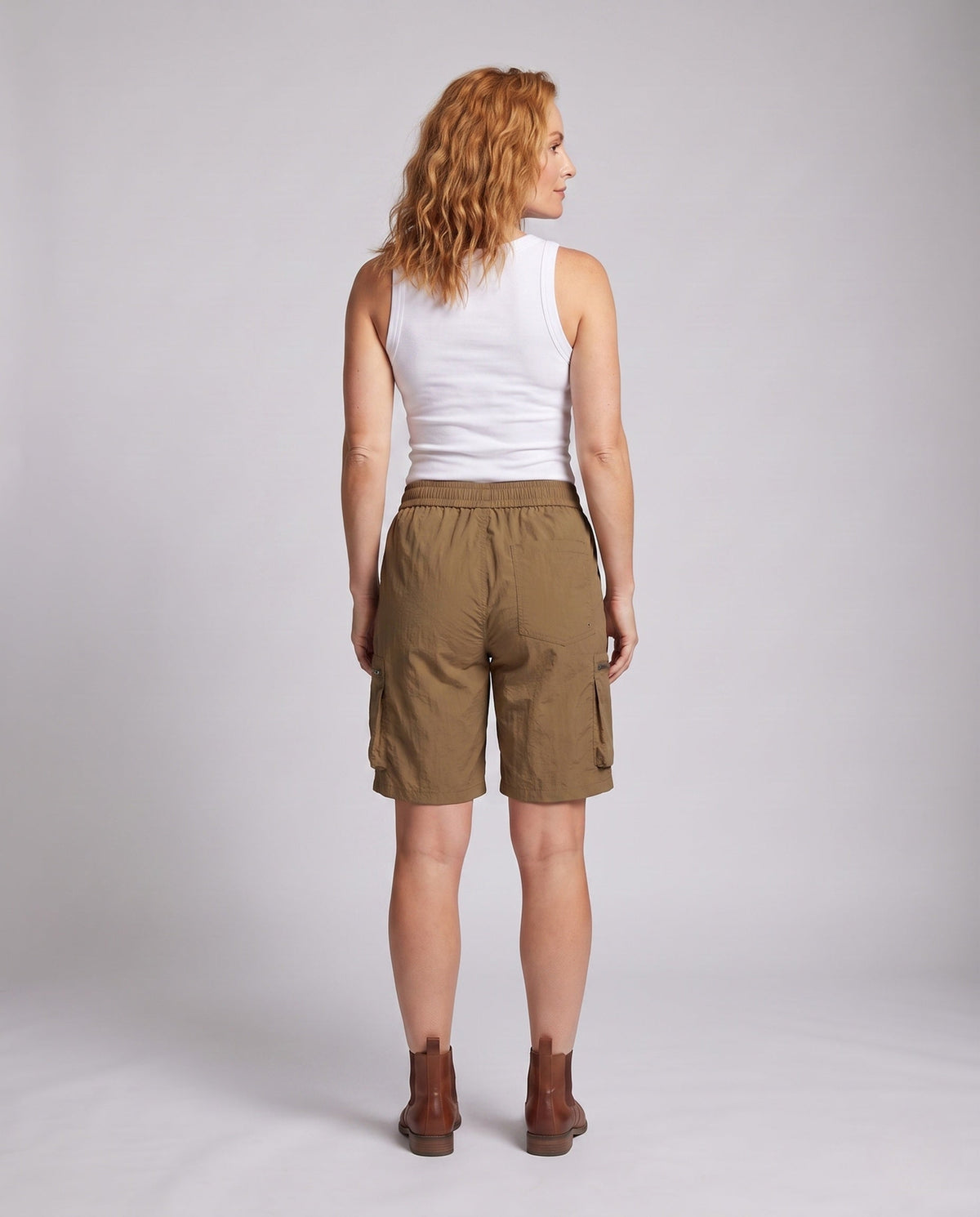 Women's sporty cargo shorts with practical zip pockets - back view