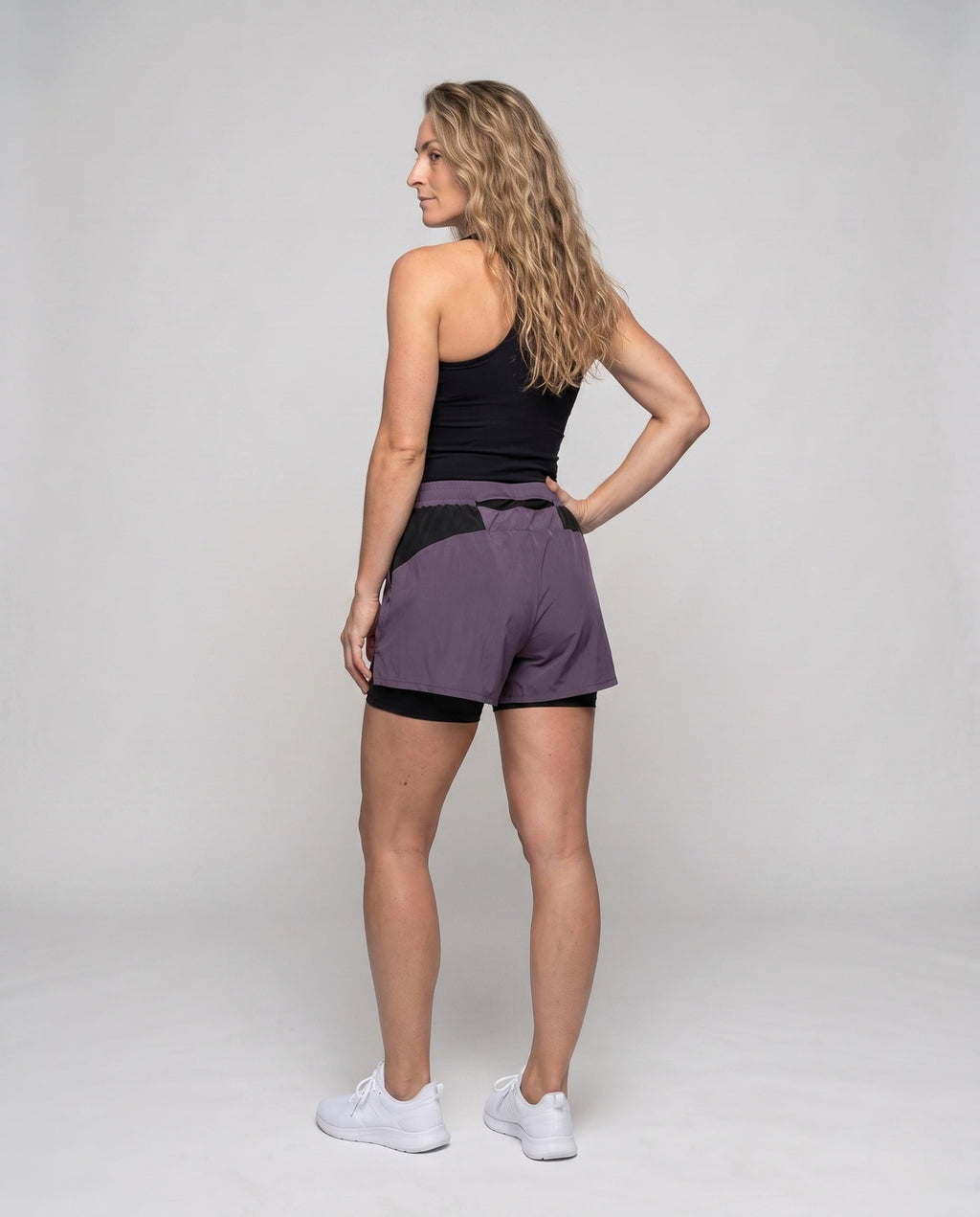 Women's sporty running shorts with innovative Möbius band and breathable inserts - back view