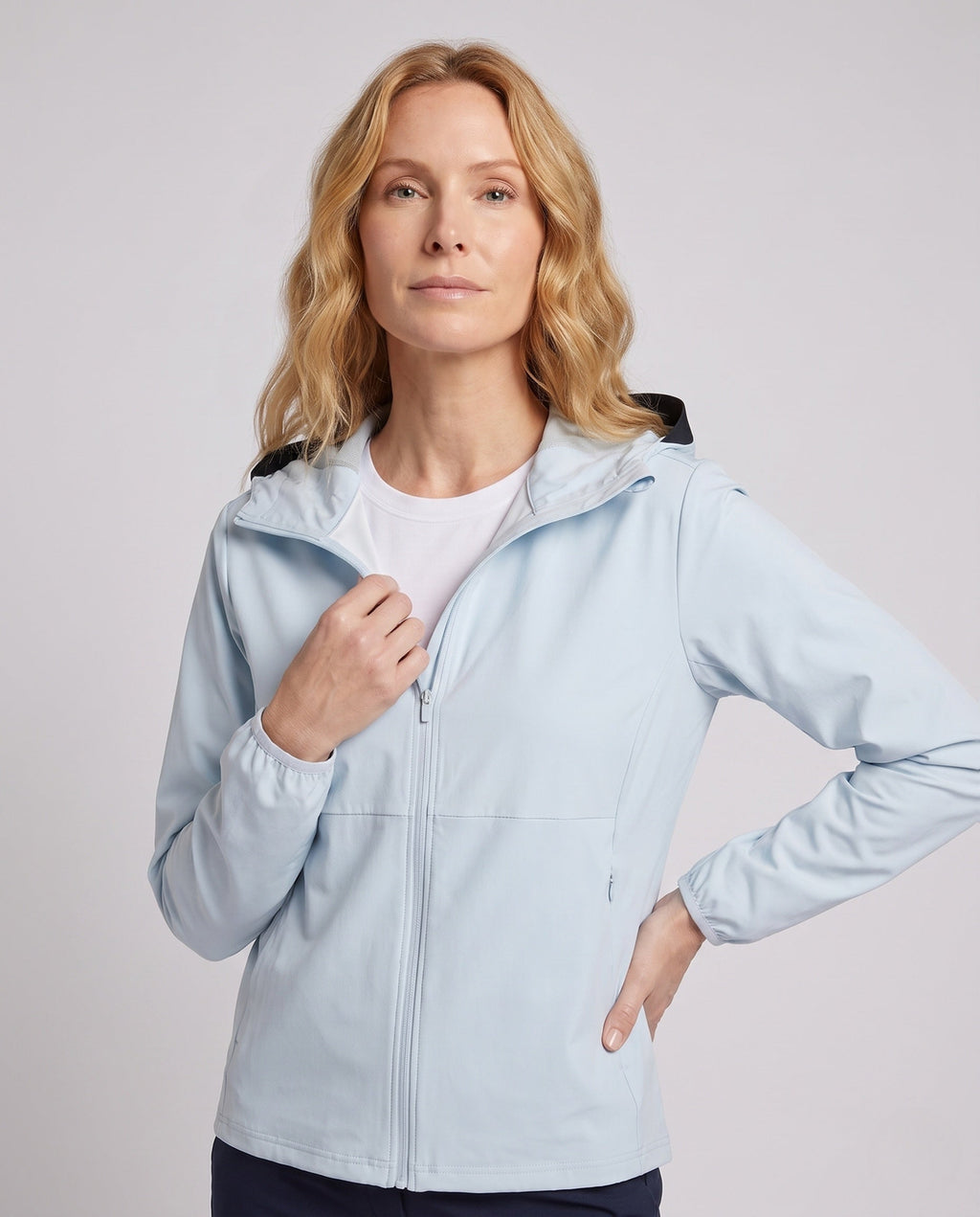 Women's lightweight functional jacket with stowable hood design All Fashion - upper body view