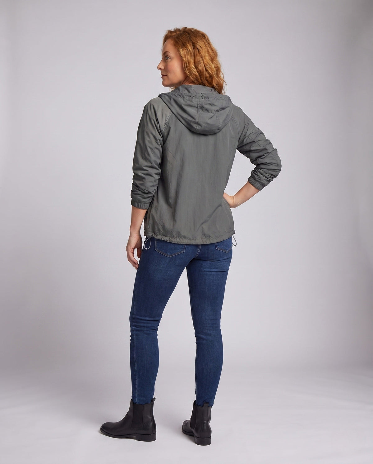 Women's lightweight transitional jacket with practical pockets and hood All Fashion - back view