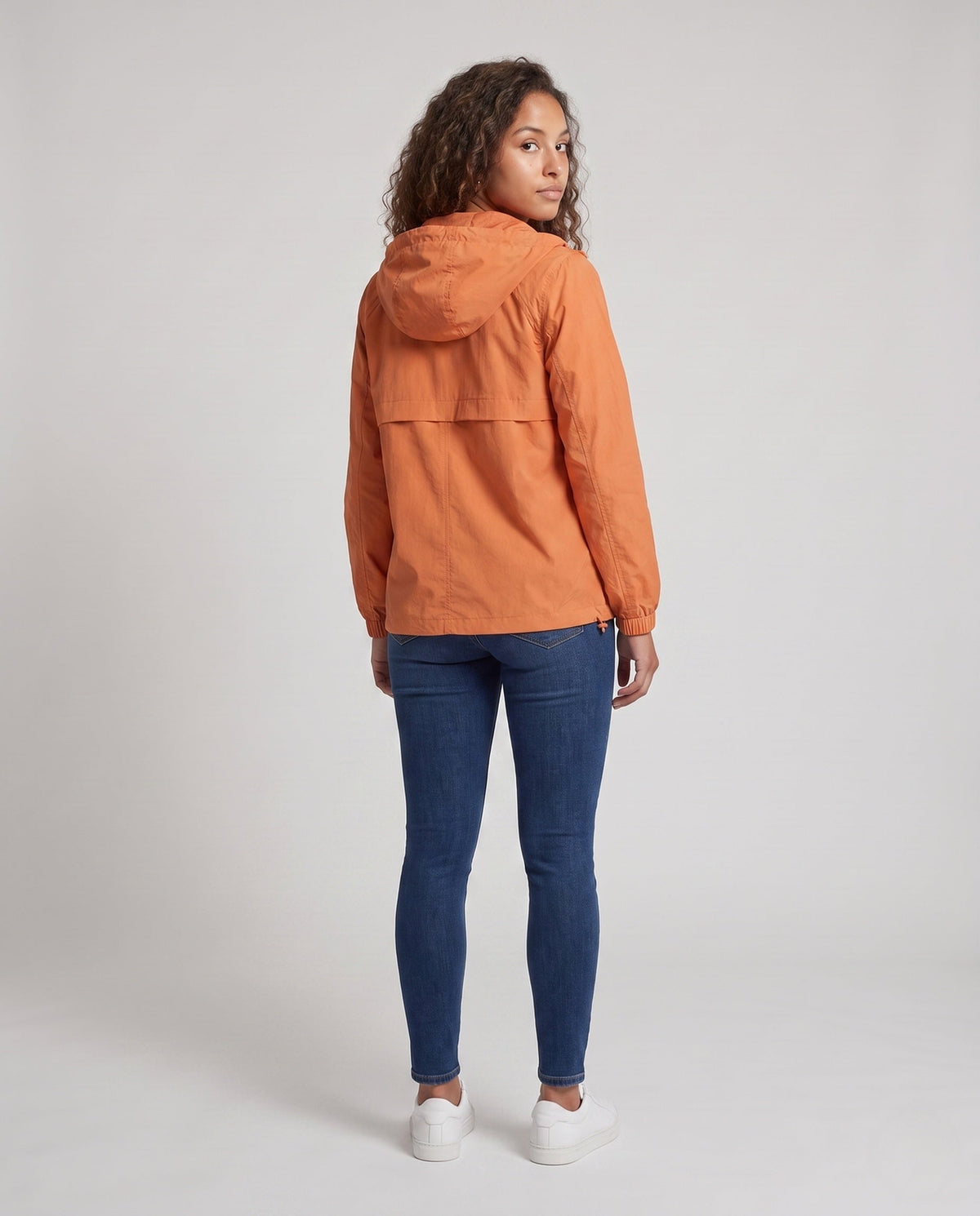 Women's lightweight windbreaker jacket with adjustable hood and elastic cuffs All Fashion - back view