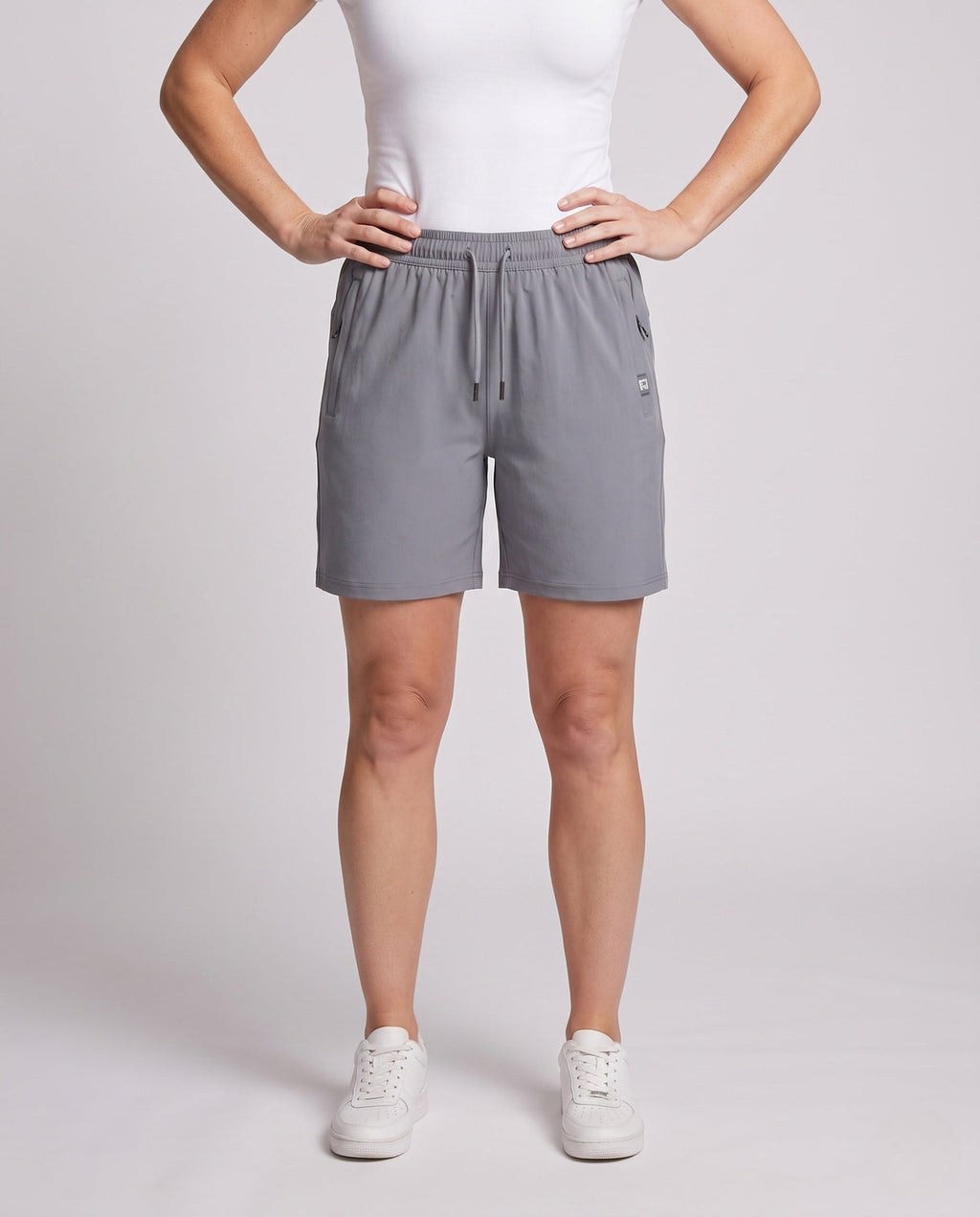 Ladies' sporty shorts with practical pockets - lower body view