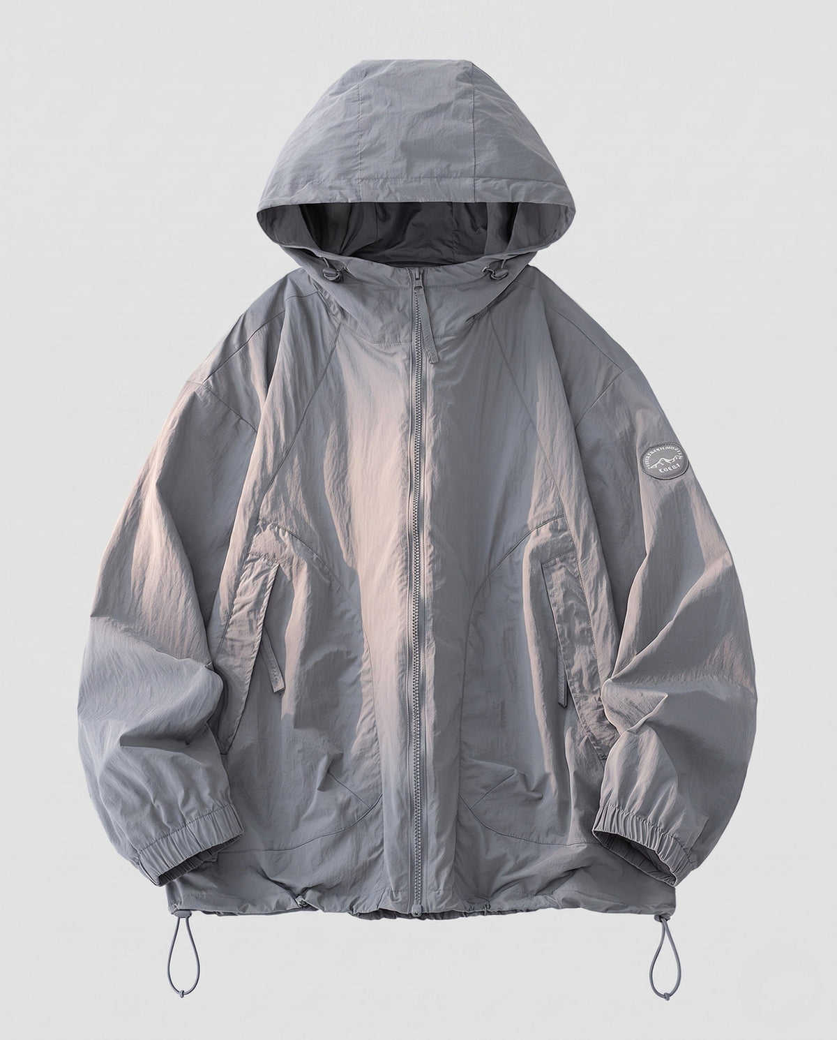 Unisex nan lightweight windproof hooded jacket in oversized cut with adjustable hem All Fashion - product shot