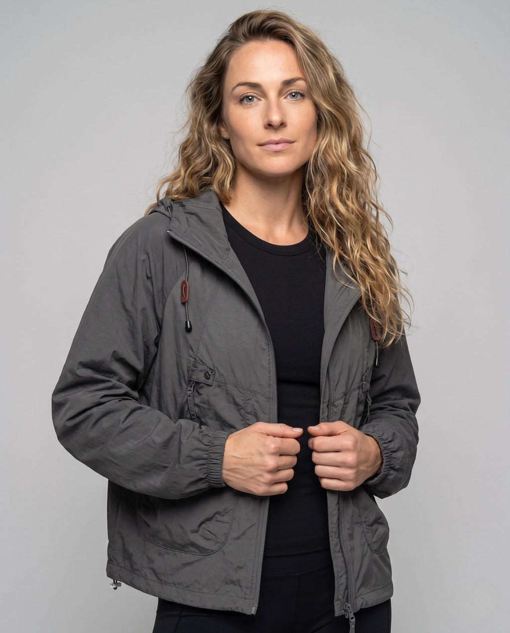 Unisex nan technical packable hooded windbreaker with 2-way zipper, ventilation inserts and adjustable hem All Fashion - upper body view