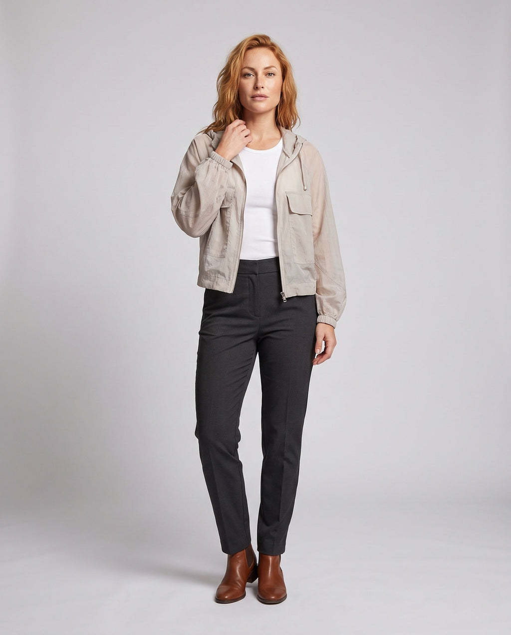 Women's lightweight short jacket in cargo style with hood, balloon sleeves, and patched pockets All Fashion - front view