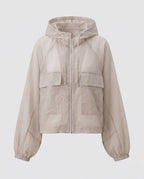 Women's lightweight short jacket in cargo style with hood, balloon sleeves, and patched pockets All Fashion - product shot