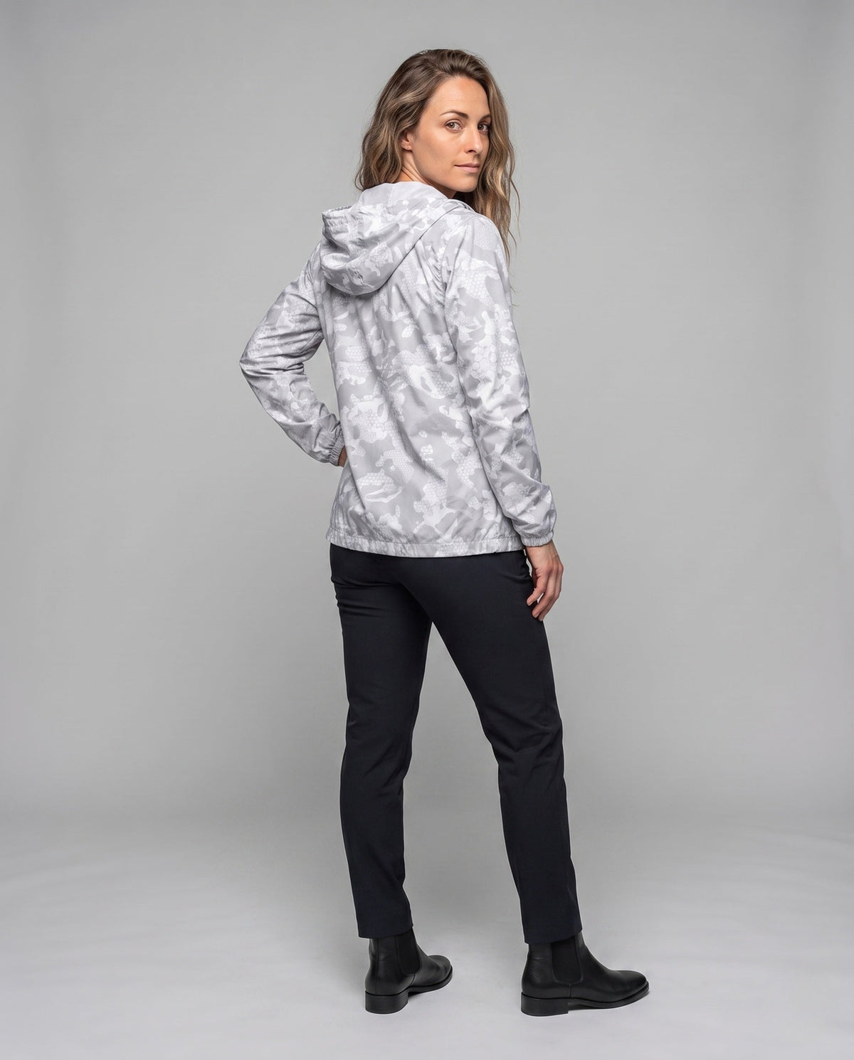 Women's travel-friendly hoodie jacket with hexagonal structure print, finely knitted microfiber finish, and elastic hem All Fashion - back view