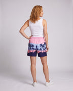 Women's stylish swim shorts with tropical pattern - back view