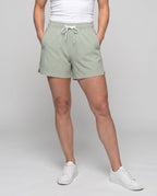 Women's sporty running shorts with elastic waistband and breathable inserts - lower body view