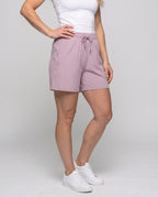 Women's sporty shorts with elastic waistband and practical pockets - lower body view