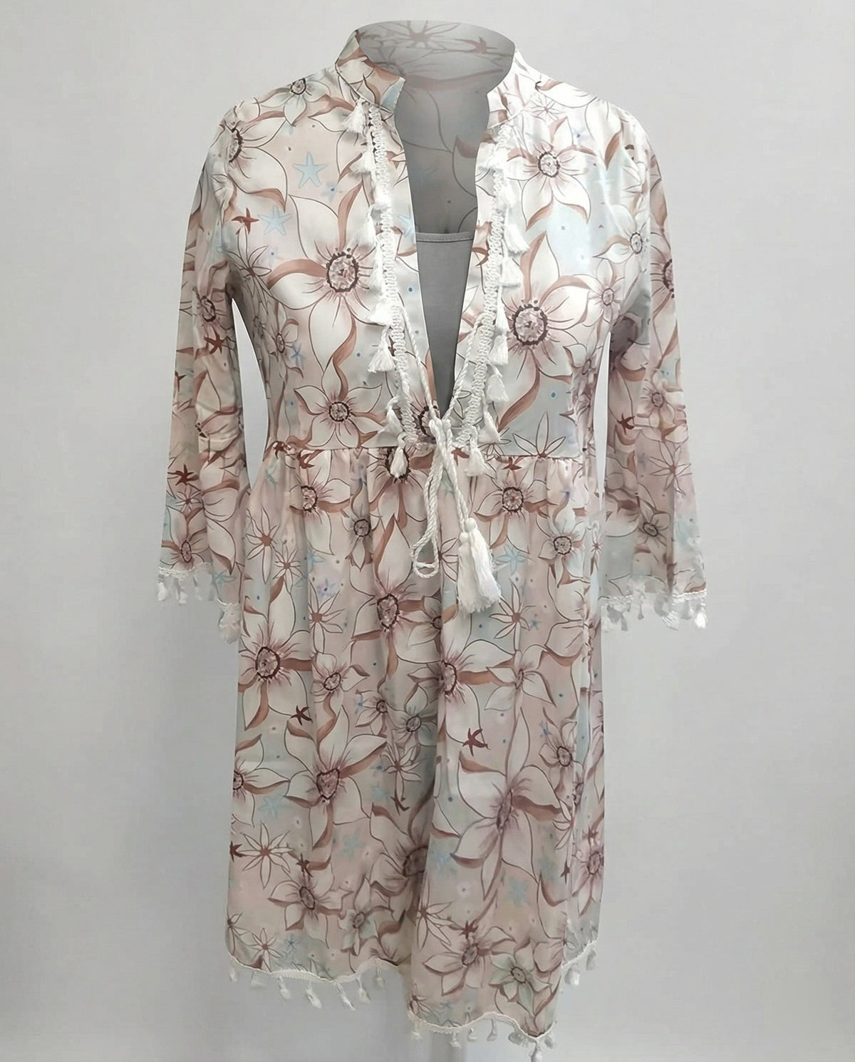 Women's beach dress with high collar and romantic floral pattern