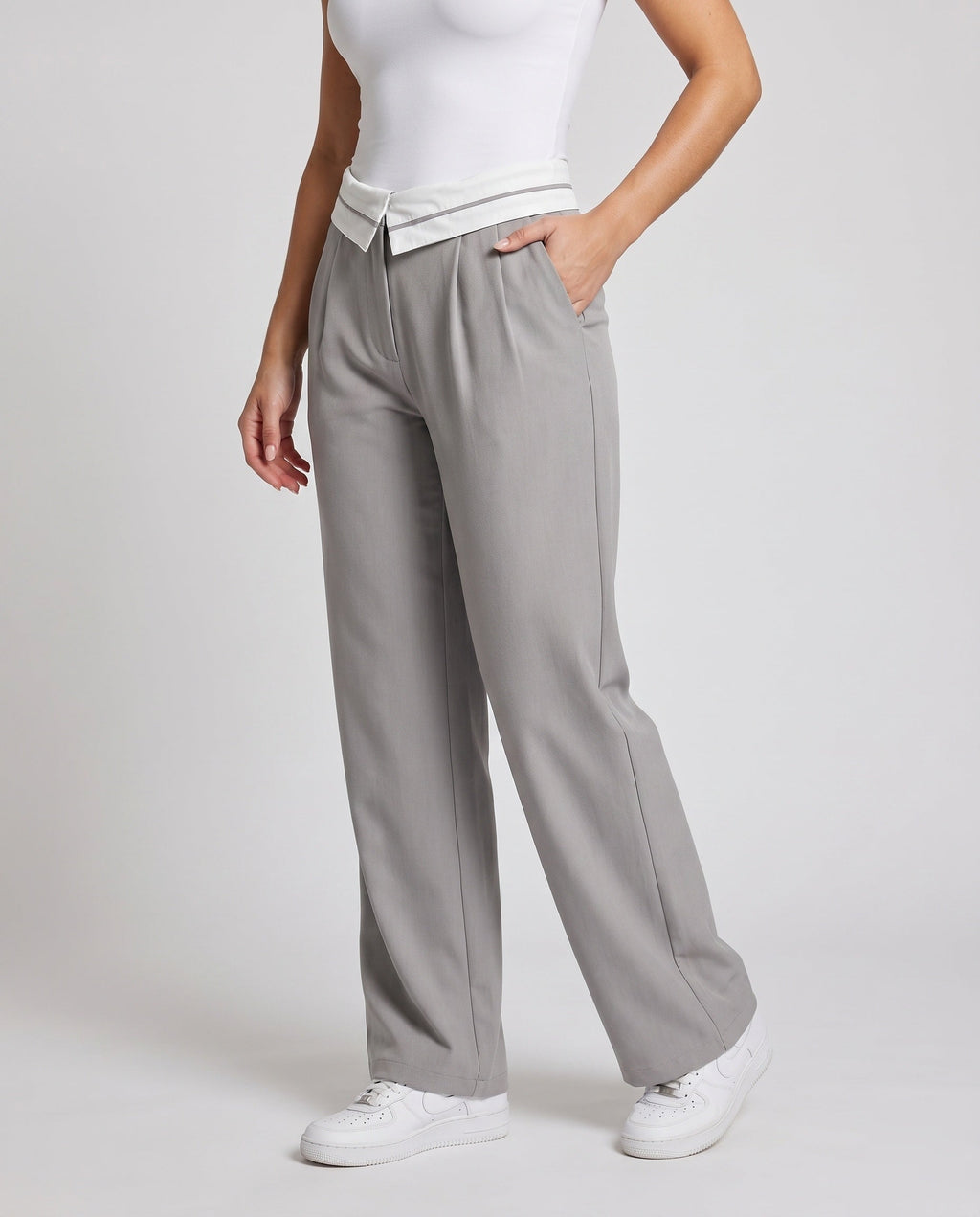 Women's elegant cropped trousers with stylish pleat design - lower body view