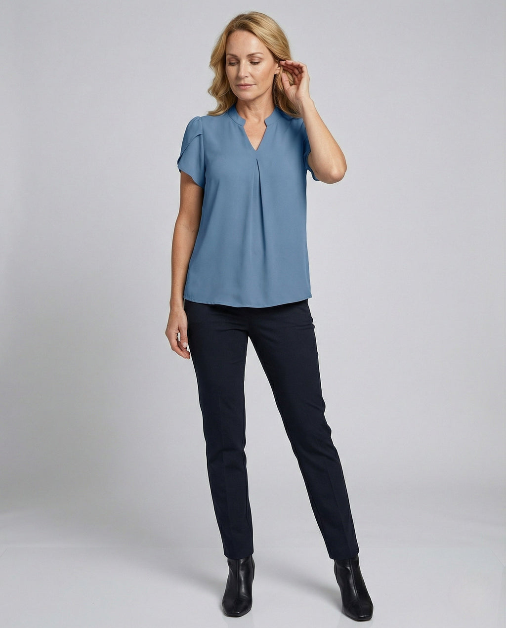 Blouse top women with V-neck and puff sleeves - front view