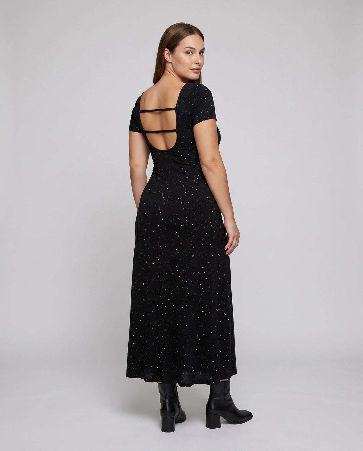 Women's figure-hugging dress with ruffle details and back lacing - back view
