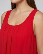Women's airy dress with ruffled hem and asymmetrical design - detail close-up