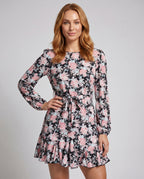 Women's blouse dress with floral ruffles and tie belt - upper body view
