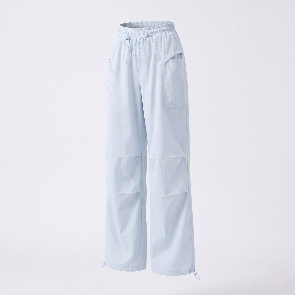 Women's technical cargo pants with adjustable waistband and multifunctional pockets - product shot