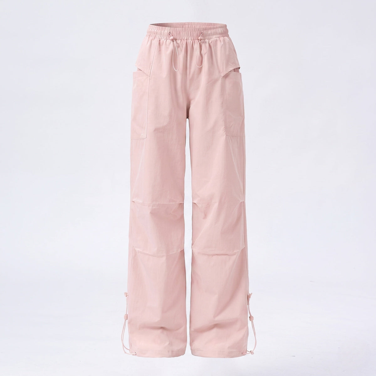 Women's technical cargo pants with adjustable waistband and multifunctional pockets - product shot